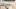 Computerbildschirm und schreibende Person